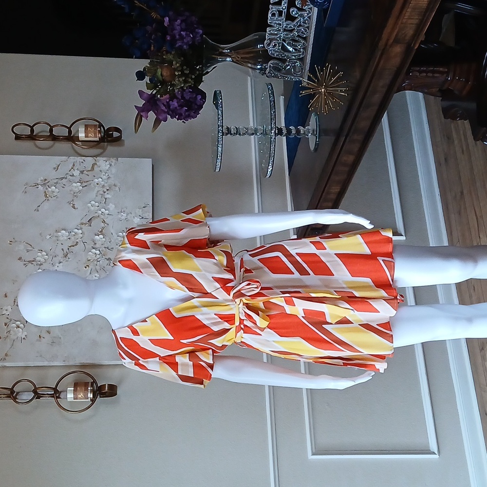 New Vibrant Orange and Yellow Patterned Wrap Mini Rorper. Size L - Picture 5 of 17
